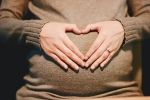 heart hands on stomach