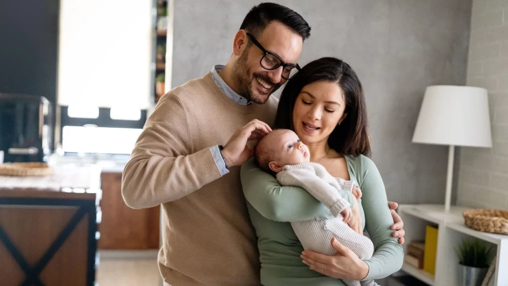 International surrogacy process with intended parents and newborn