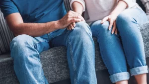 Intended parents supporting each other during their surrogacy journey after an unsuccessful embryo transfer